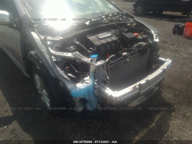 Photo 5 VIN: JHMZE2H71ES001688 - HONDA INSIGHT 