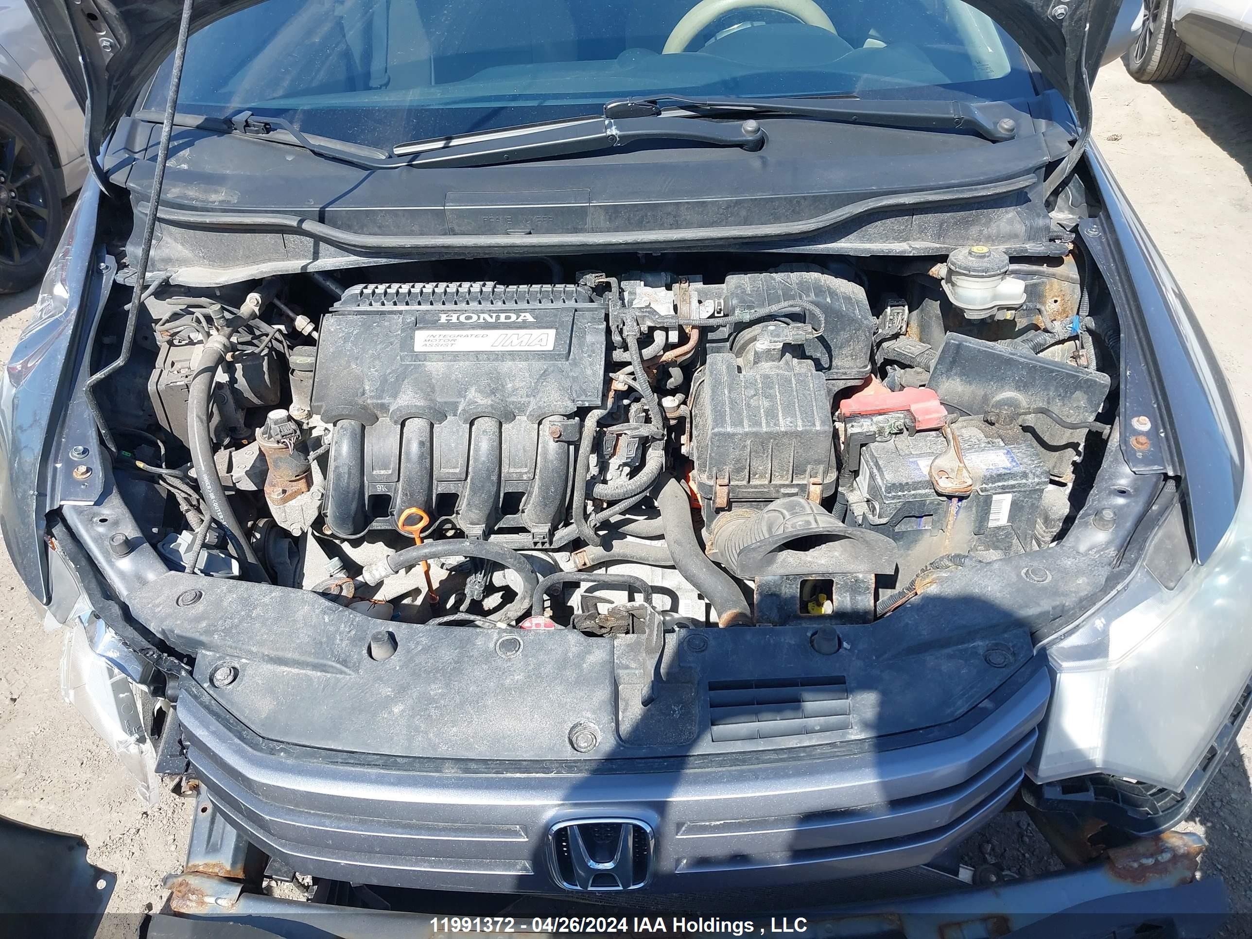 Photo 9 VIN: JHMZE2H73AS802083 - HONDA INSIGHT 