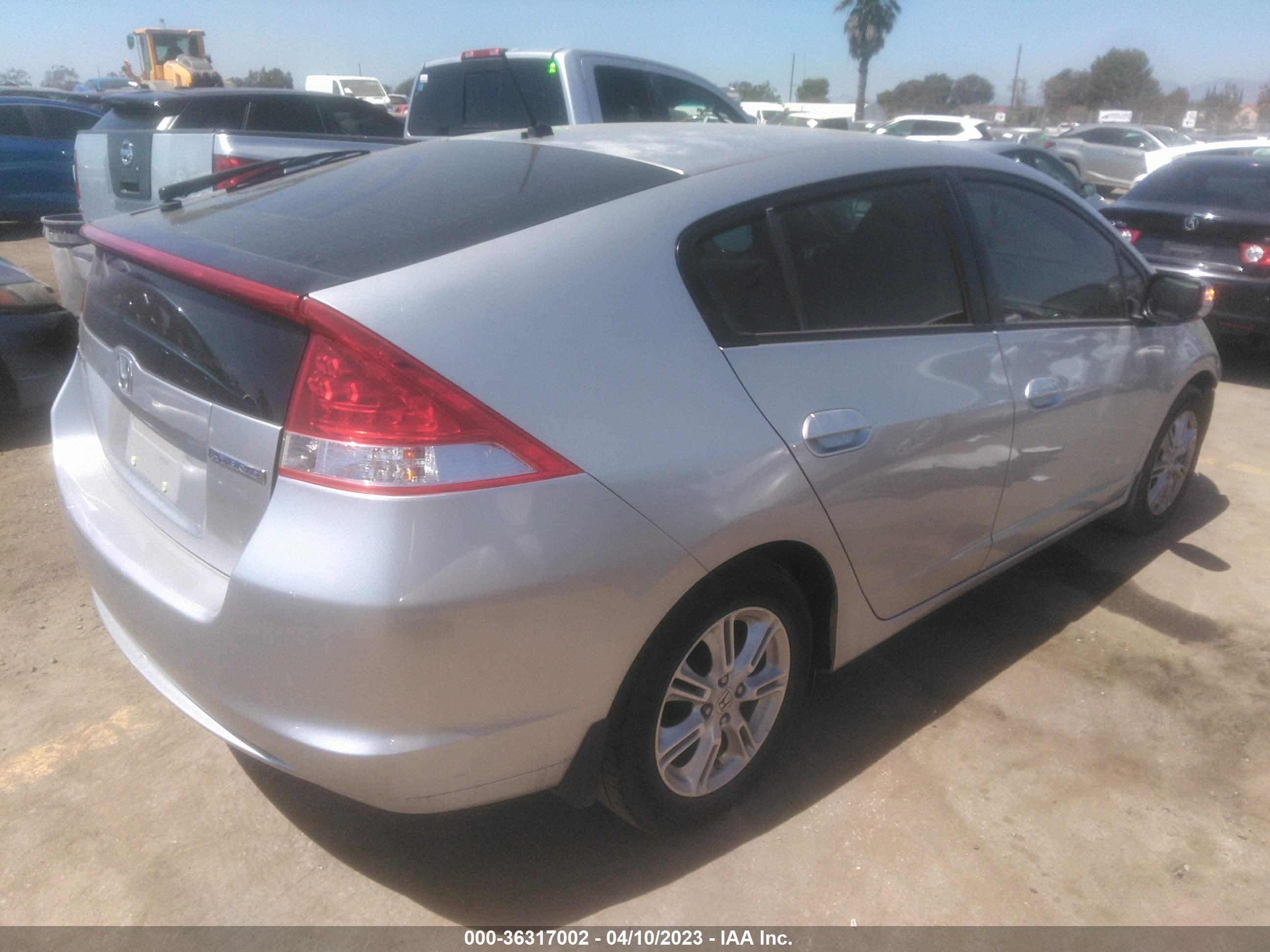 Photo 3 VIN: JHMZE2H7XAS030875 - HONDA INSIGHT 