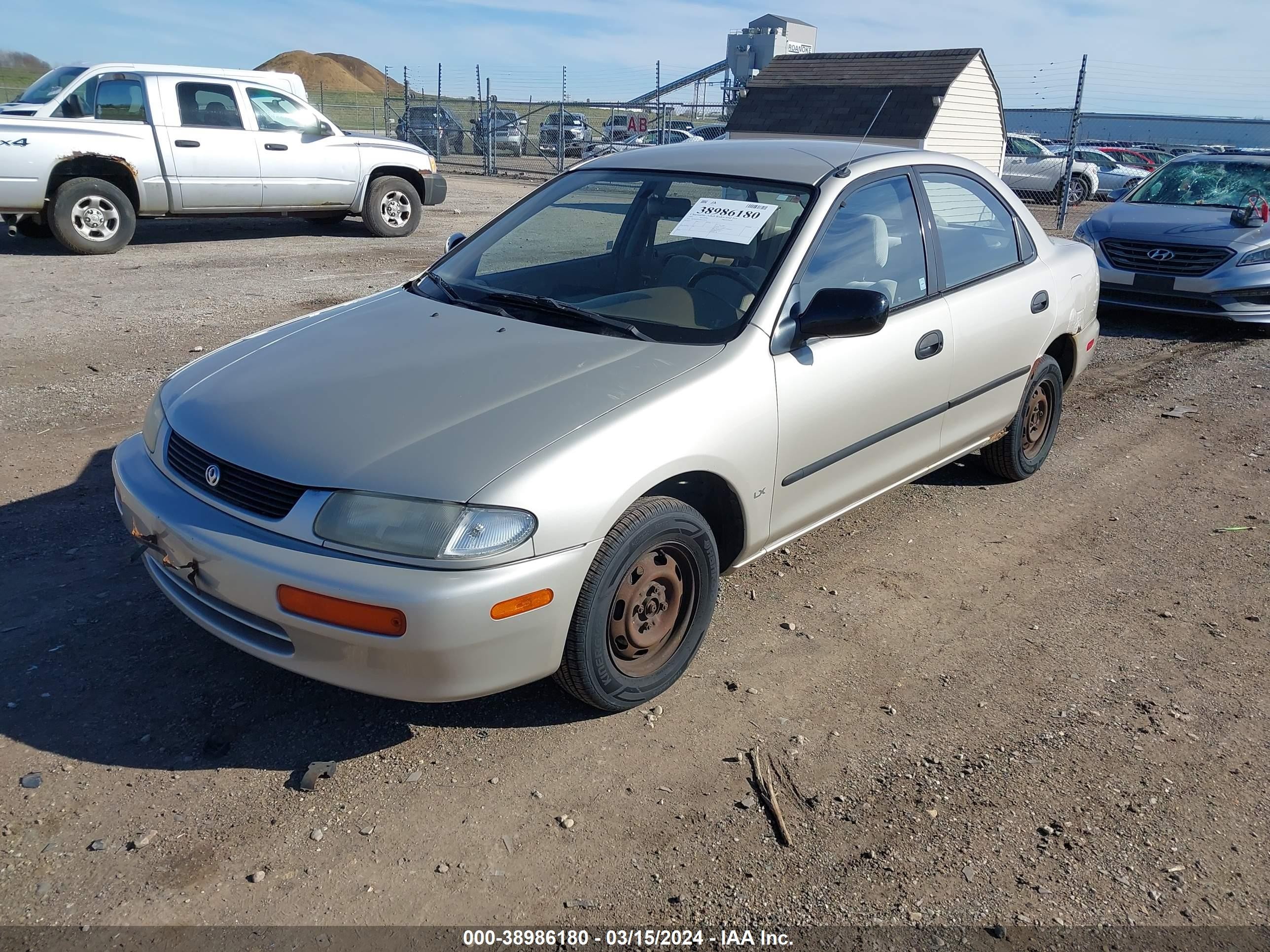 Photo 1 VIN: JM1BA1416S0122539 - MAZDA PROTEGE 