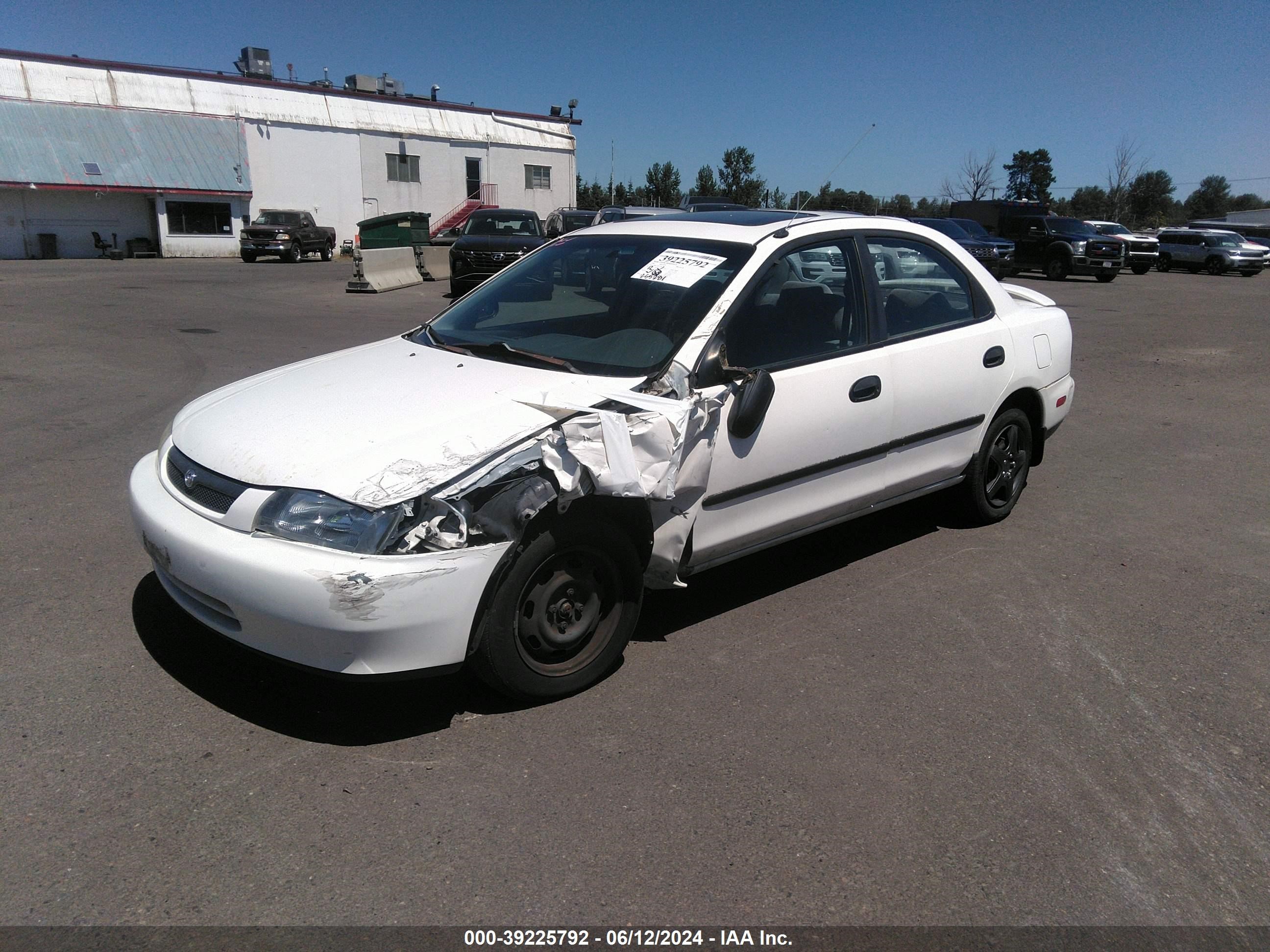 Photo 1 VIN: JM1BC1410V0166700 - MAZDA PROTEGE 