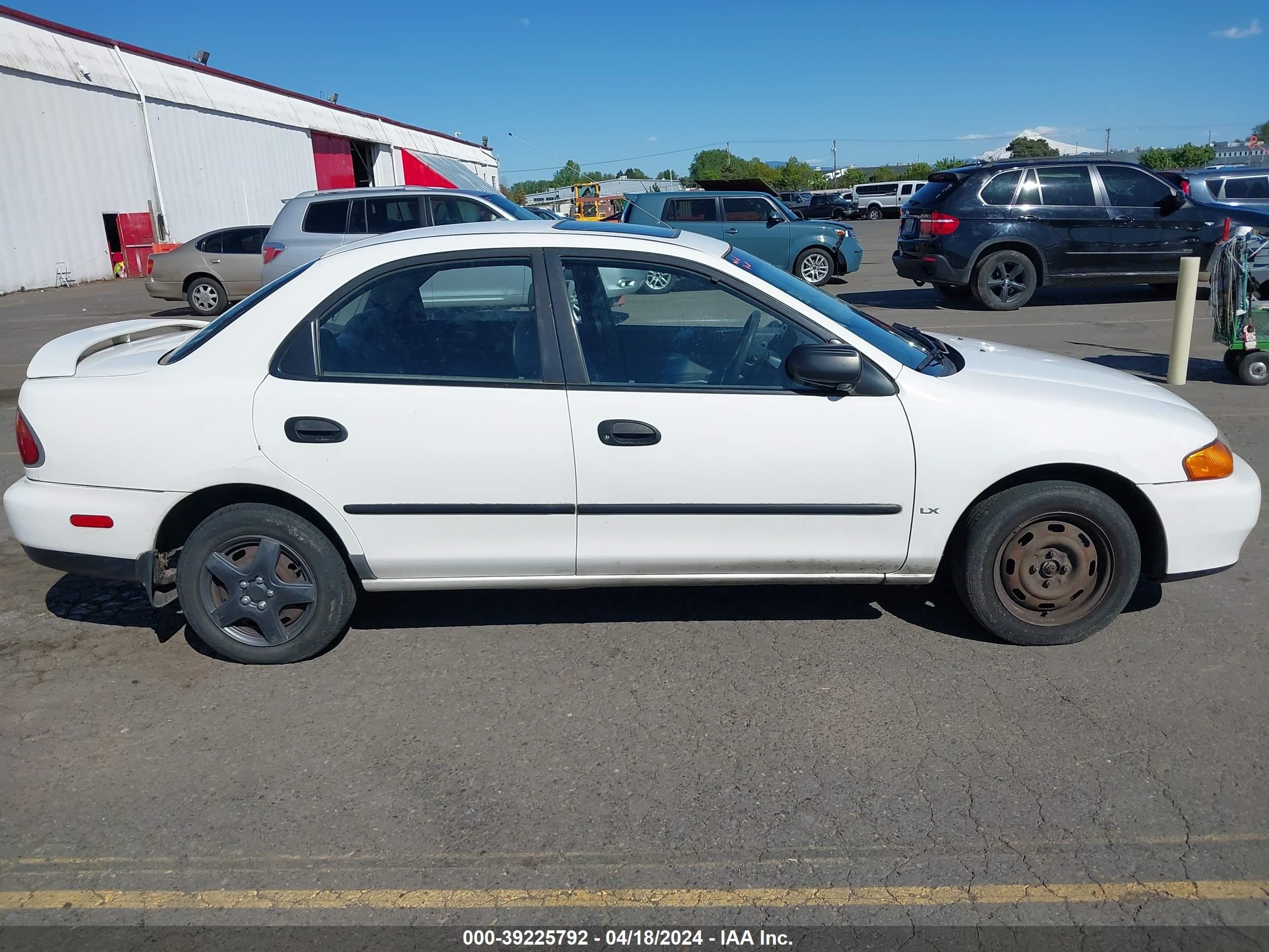 Photo 12 VIN: JM1BC1410V0166700 - MAZDA PROTEGE 