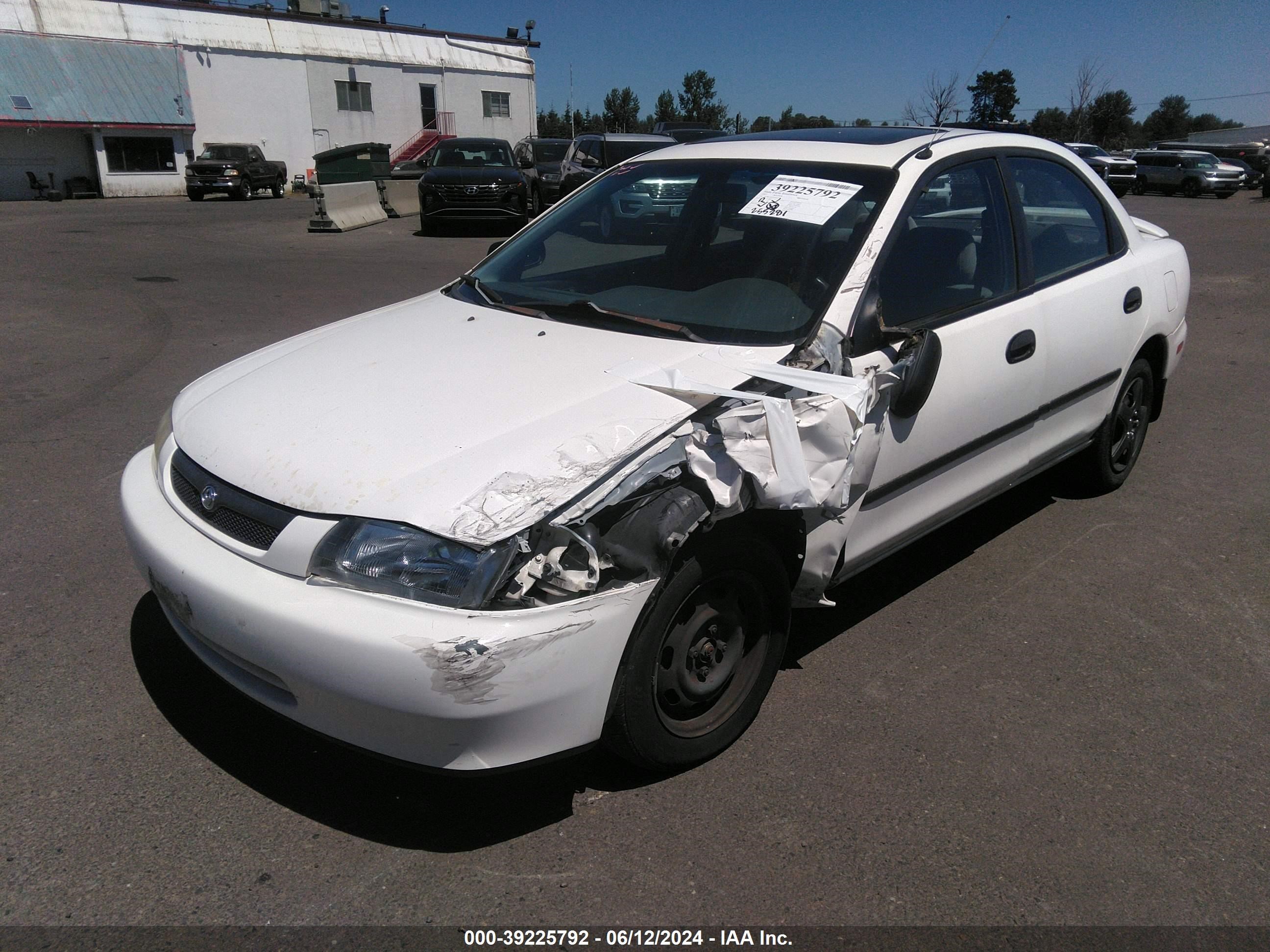 Photo 5 VIN: JM1BC1410V0166700 - MAZDA PROTEGE 