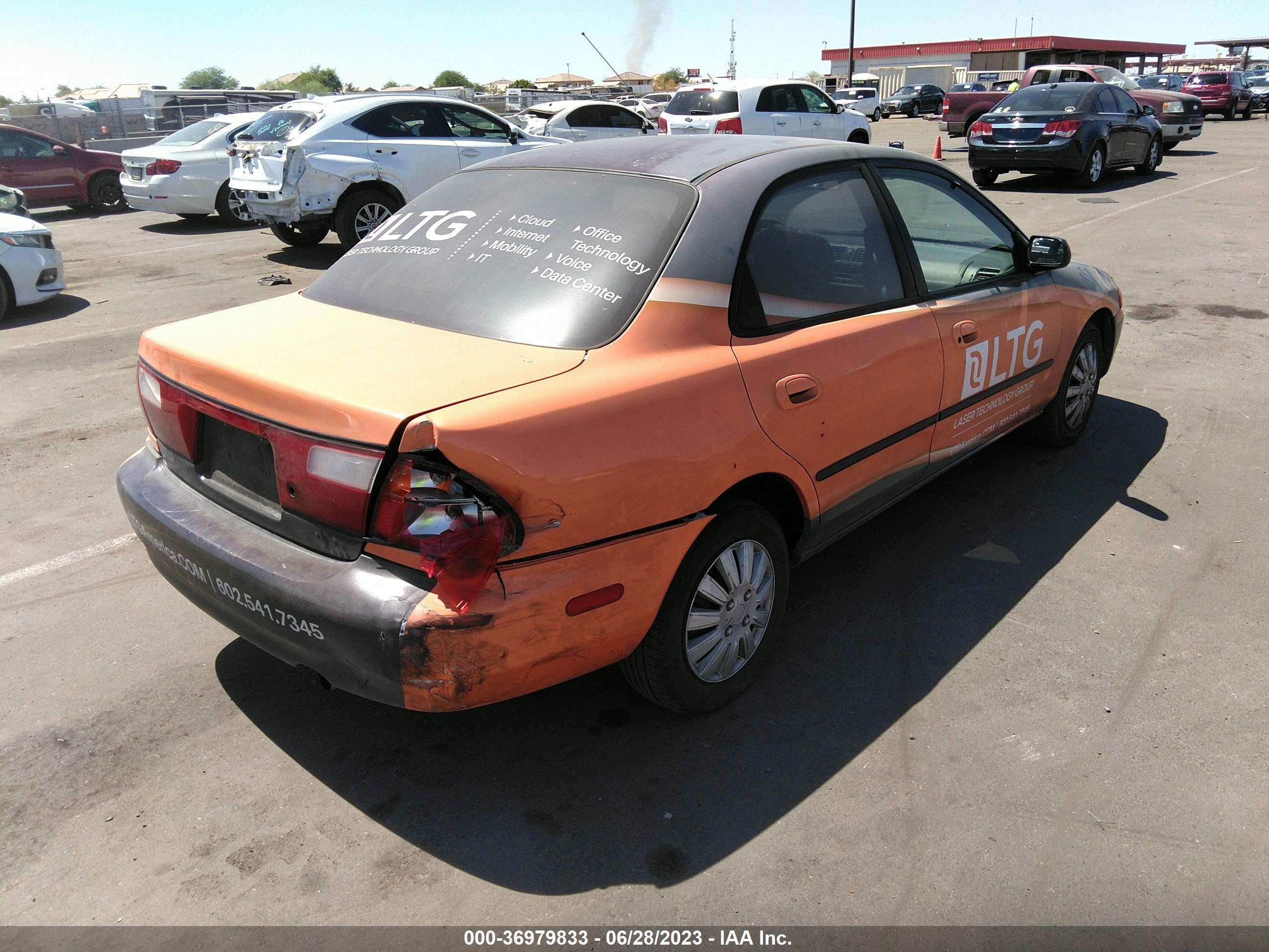 Photo 3 VIN: JM1BC1419W0228984 - MAZDA PROTEGE 