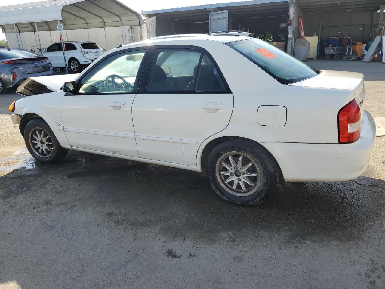 Photo 1 VIN: JM1BJ2228Y0275885 - MAZDA PROTEGE 