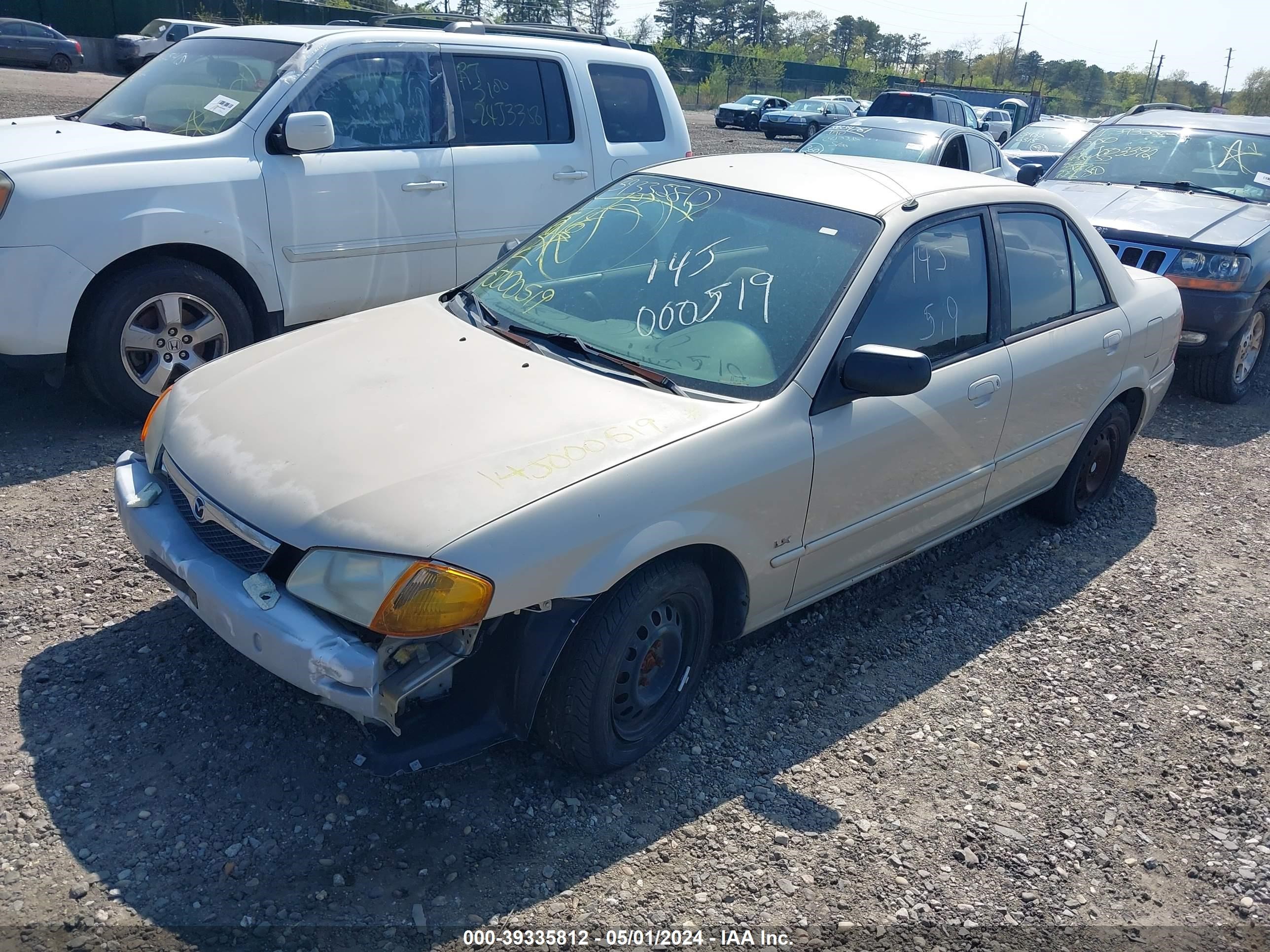 Photo 1 VIN: JM1BJ2228Y0299409 - MAZDA PROTEGE 