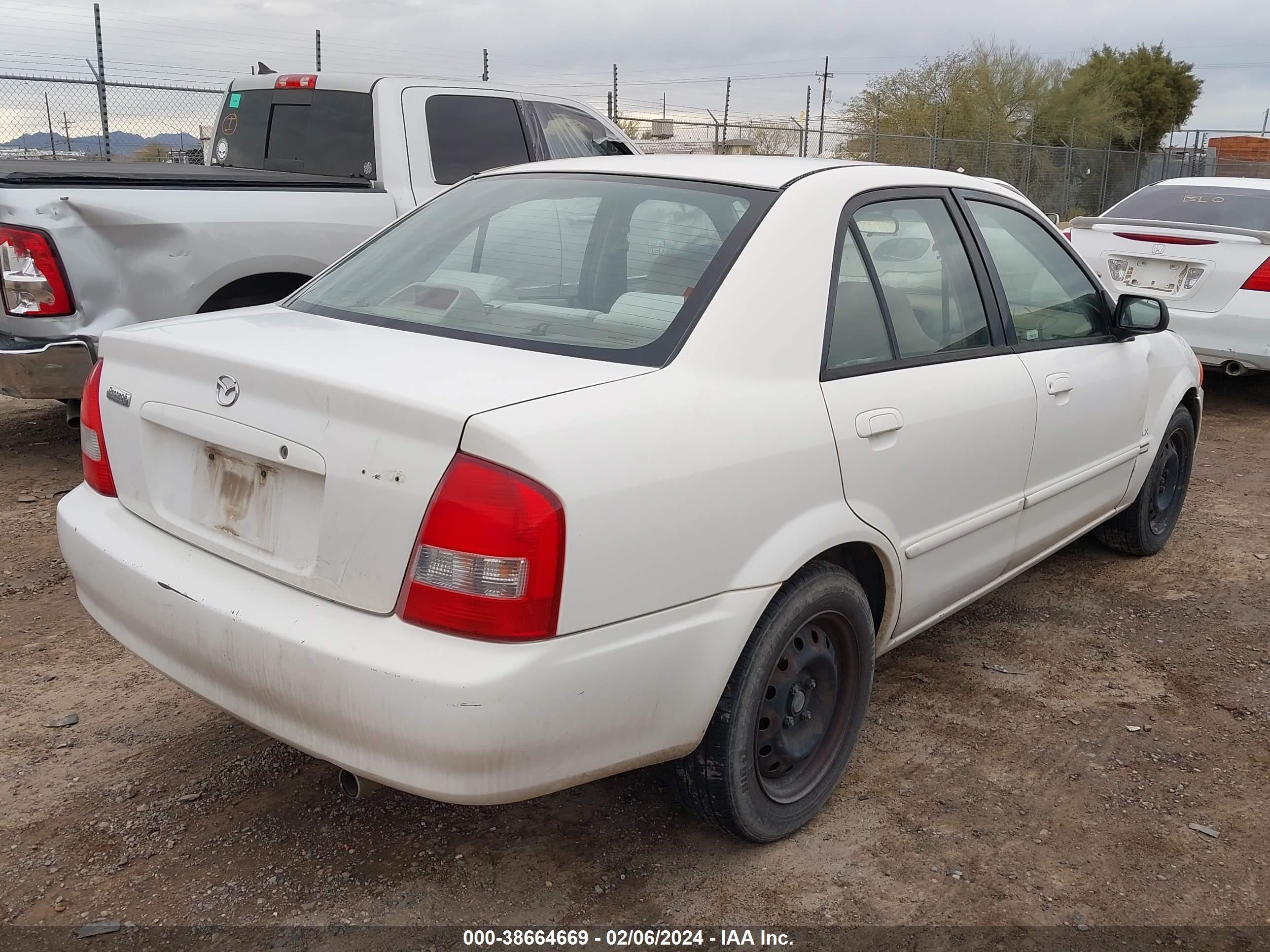 Photo 3 VIN: JM1BJ222XY0244508 - MAZDA PROTEGE 