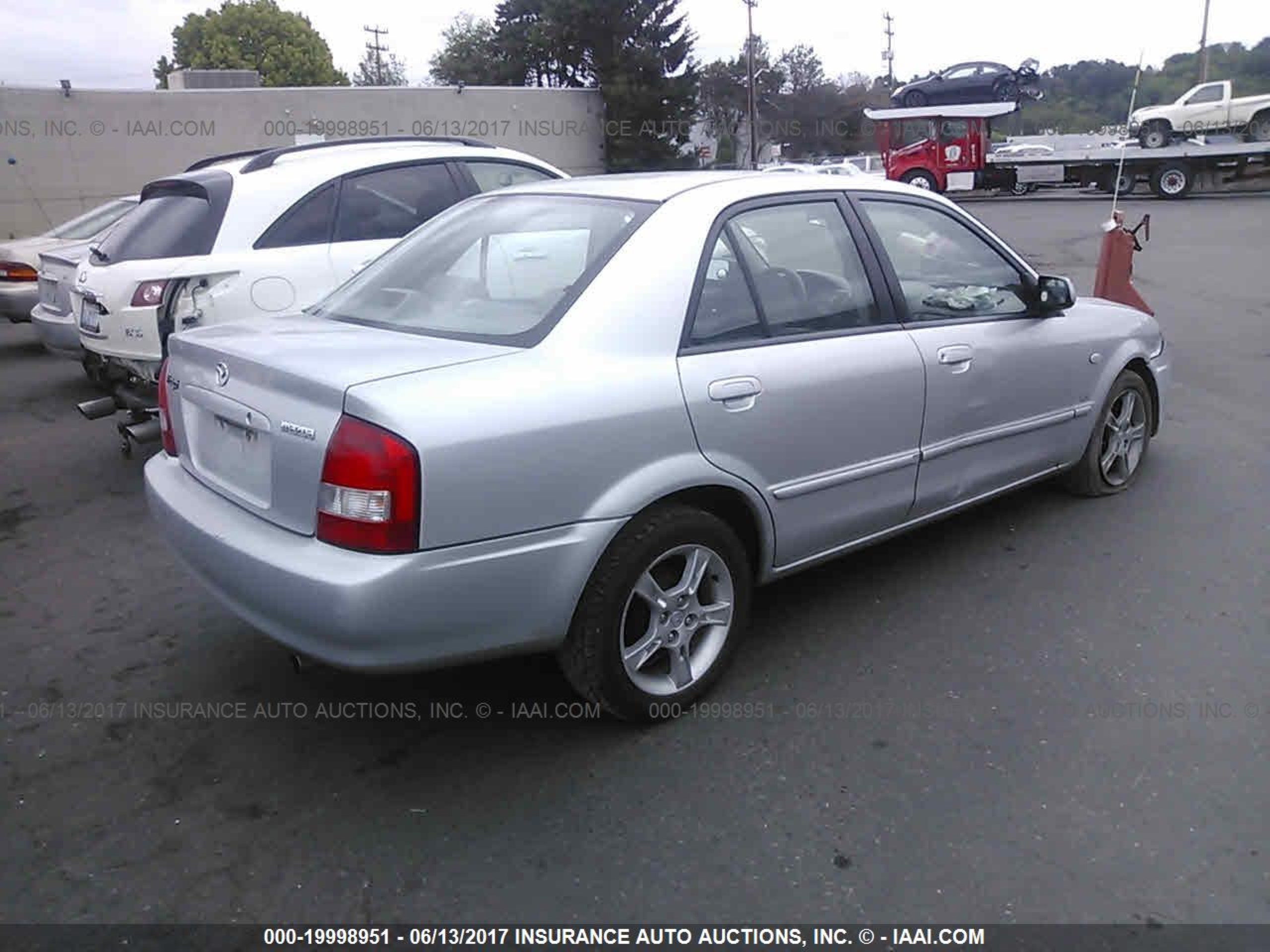 Photo 3 VIN: JM1BJ225030190087 - MAZDA PROTEGE 