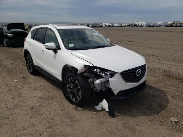 Photo 0 VIN: JM3KE2DY1G0764382 - MAZDA CX-5 GT 