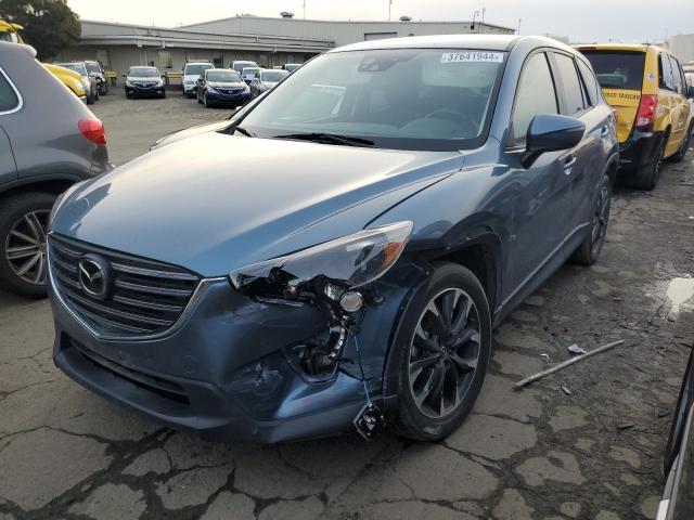 Photo 0 VIN: JM3KE2DYXG0863475 - MAZDA CX-5 