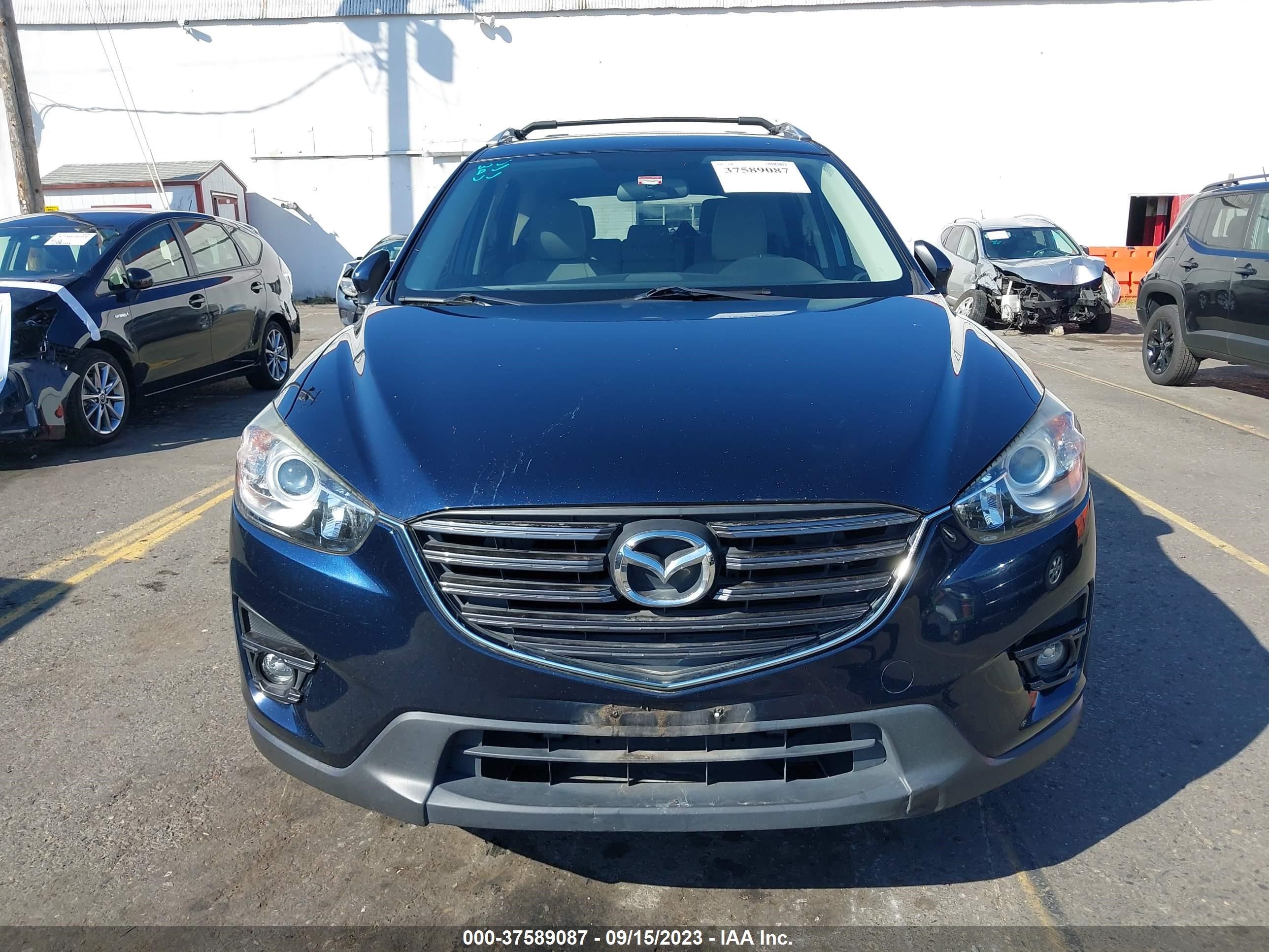 Photo 11 VIN: JM3KE4CY8G0675468 - MAZDA CX-5 