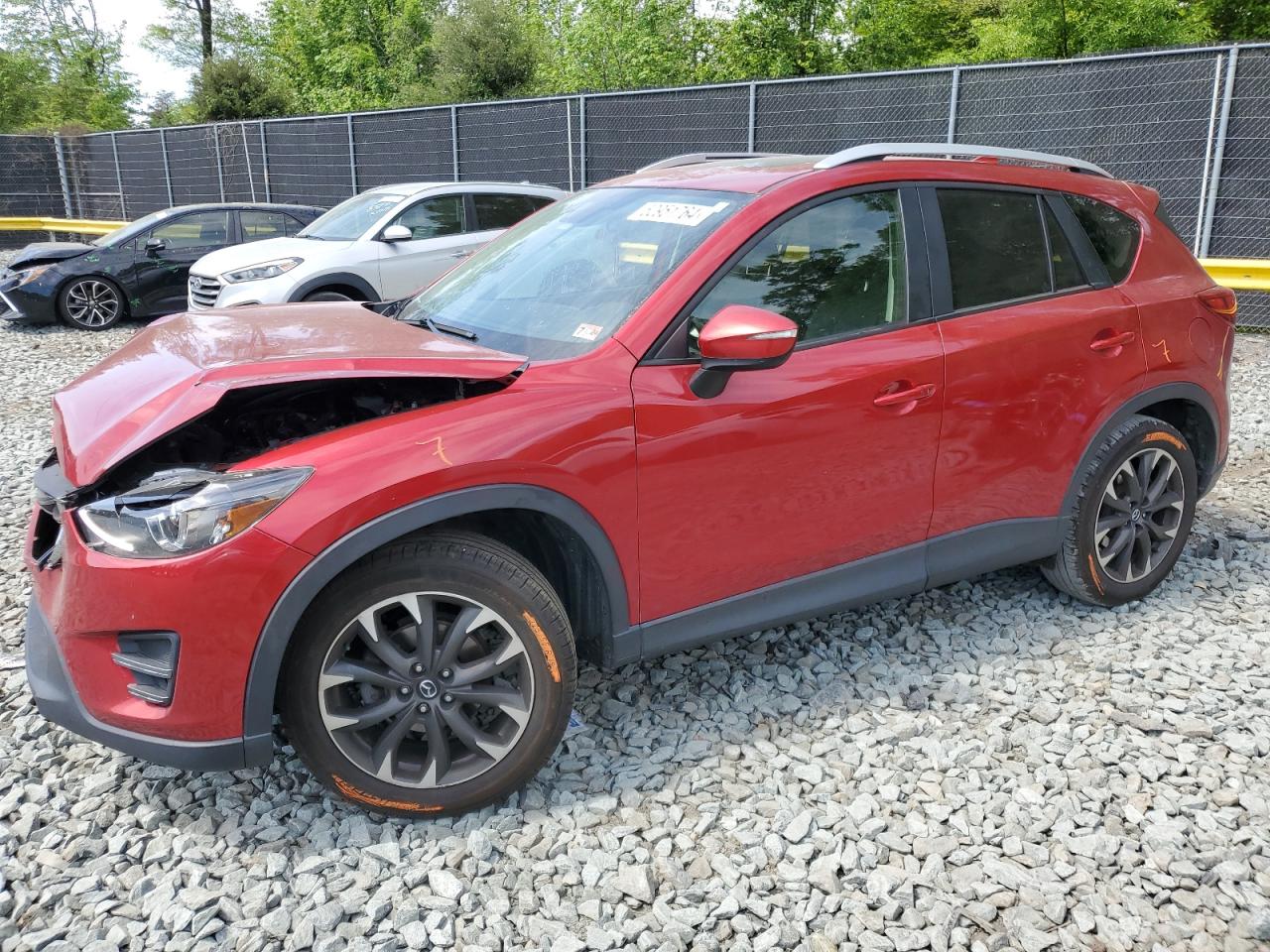 Photo 0 VIN: JM3KE4DY2G0704977 - MAZDA CX-5 