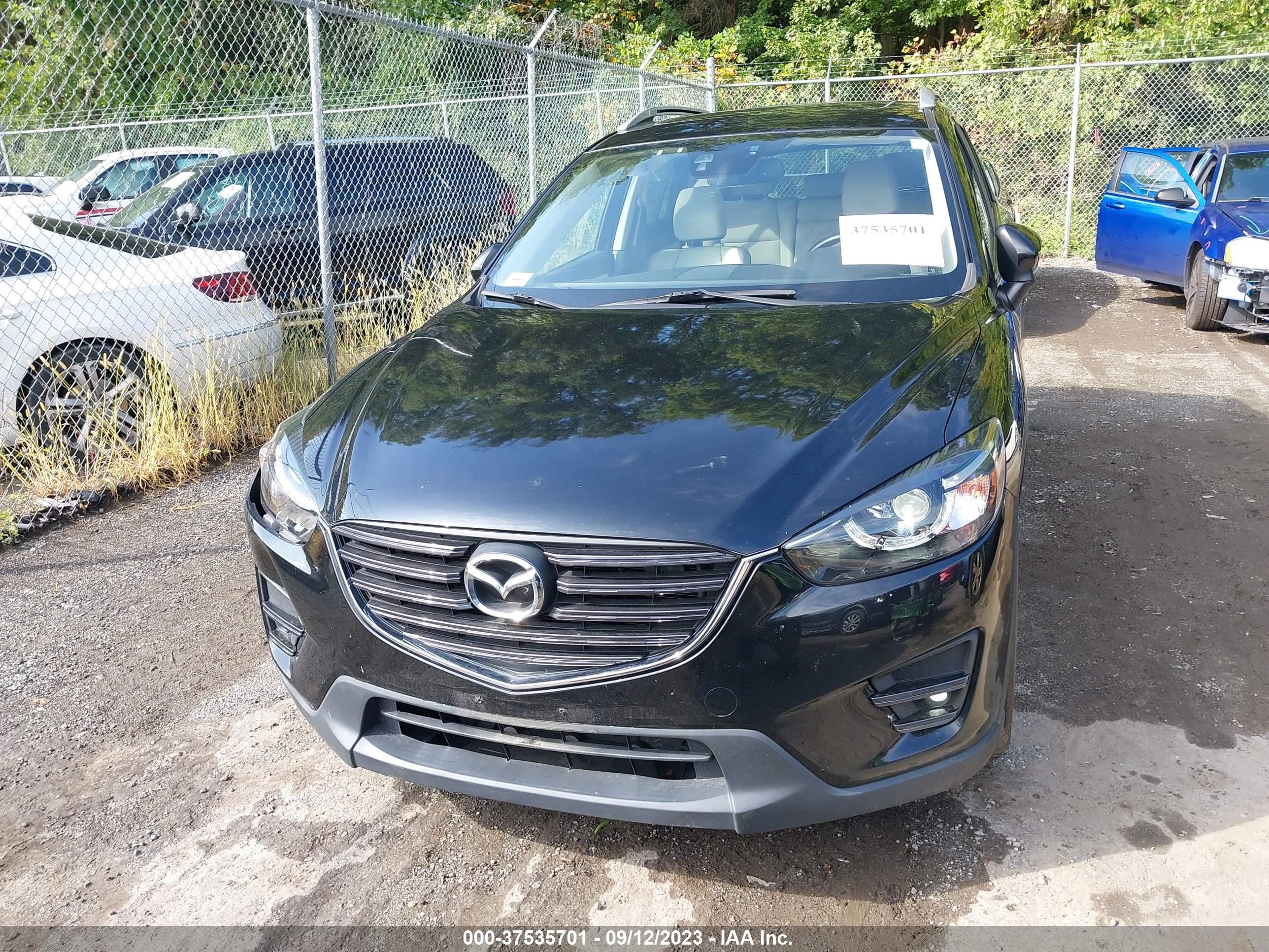 Photo 11 VIN: JM3KE4DY3G0629593 - MAZDA CX-5 