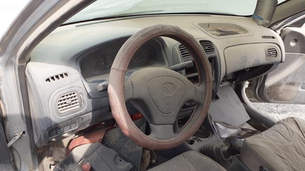 Photo 15 VIN: JM7BJ1235X0101215 - MAZDA 323 