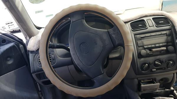 Photo 11 VIN: JM7BJ123631219679 - MAZDA 323 