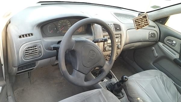 Photo 11 VIN: JM7BJ123931221104 - MAZDA 323 