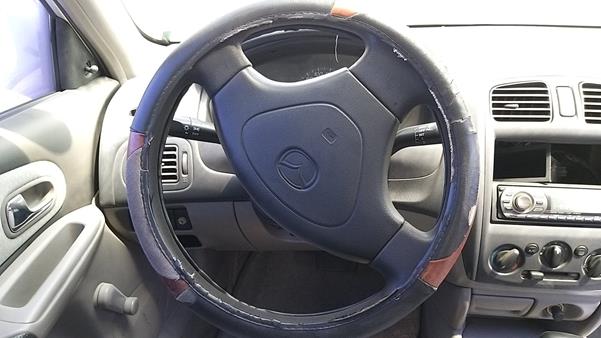 Photo 13 VIN: JM7BJ12M010203151 - MAZDA 323 