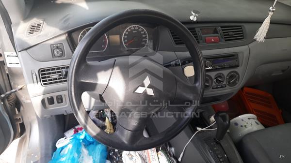 Photo 12 VIN: JMYSRCS1ADU704392 - MITSUBISHI LANCER 