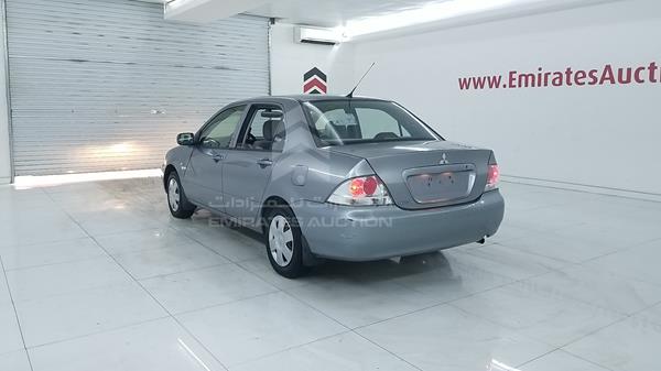 Photo 6 VIN: JMYSRCS1ADU704758 - MITSUBISHI LANCER 