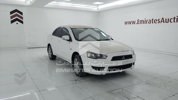 Photo 7 VIN: JMYSRCY1AFU732915 - MITSUBISHI LANCER 