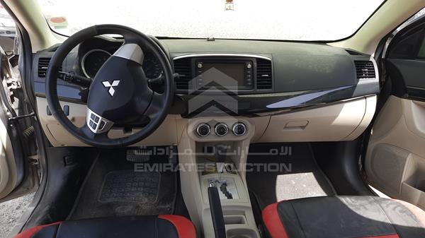 Photo 16 VIN: JMYSRCY1AGU754928 - MITSUBISHI LANCER 