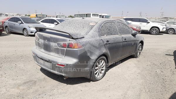 Photo 9 VIN: JMYSRCY1AGU754928 - MITSUBISHI LANCER 