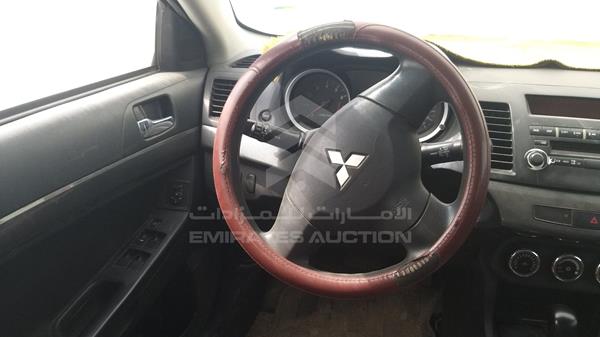 Photo 11 VIN: JMYSRCY2ABU721552 - MITSUBISHI LANCER 