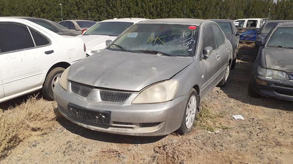 Photo 3 VIN: JMYSTCS3A7U708143 - MITSUBISHI LANCER 