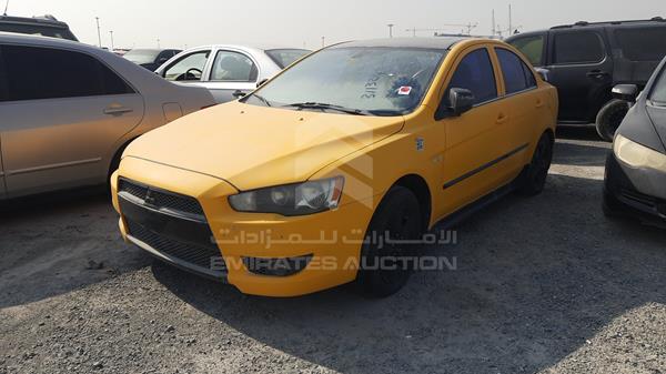 Photo 3 VIN: JMYSTCY4A9U704953 - MITSUBISHI LANCER 