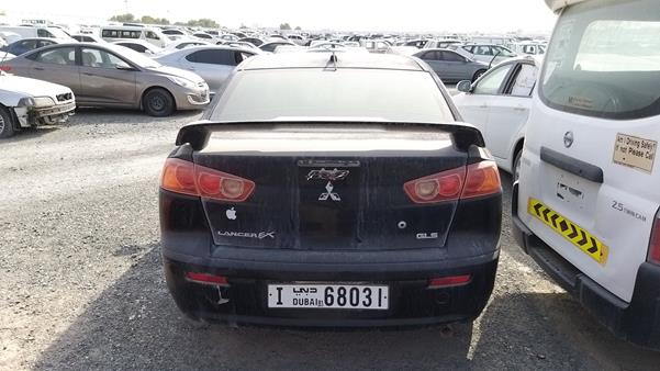 Photo 6 VIN: JMYSTCY4A9U705215 - MITSUBISHI LANCER 