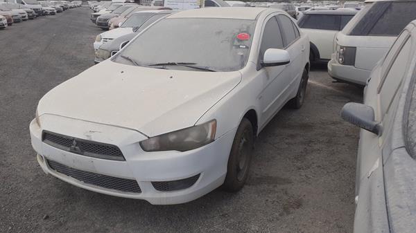 Photo 4 VIN: JMYSTCY4AAU720716 - MITSUBISHI LANCER 