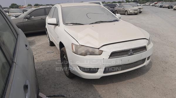 Photo 9 VIN: JMYSTCY4ABU702888 - MITSUBISHI LANCER 