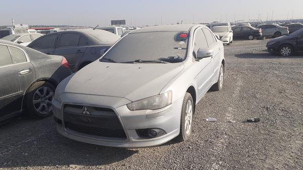 Photo 3 VIN: JMYSTCY4AFU738573 - MITSUBISHI LANCER 