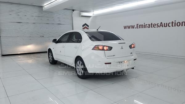 Photo 6 VIN: JMYSTCY4AGU733872 - MITSUBISHI LANCER 