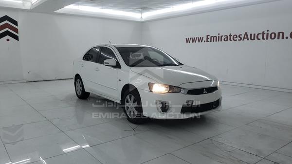 Photo 9 VIN: JMYSTCY4AGU733872 - MITSUBISHI LANCER 