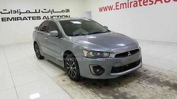 Photo 9 VIN: JMYSTCY4AGU736908 - MITSUBISHI LANCER 