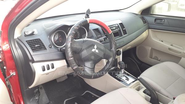 Photo 11 VIN: JMYSTCY4AGU745983 - MITSUBISHI LANCER 