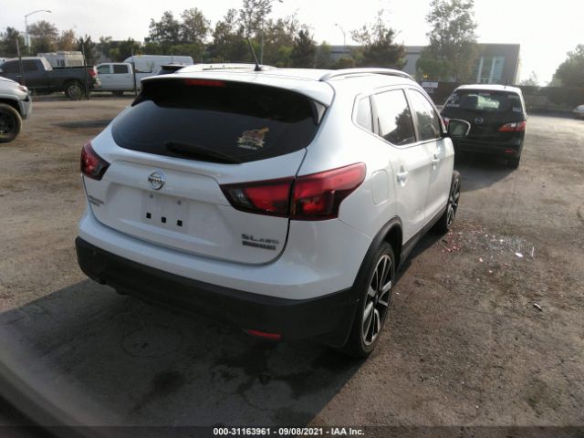 Photo 3 VIN: JN1BJ1CR7JW254571 - NISSAN ROGUE SPORT 