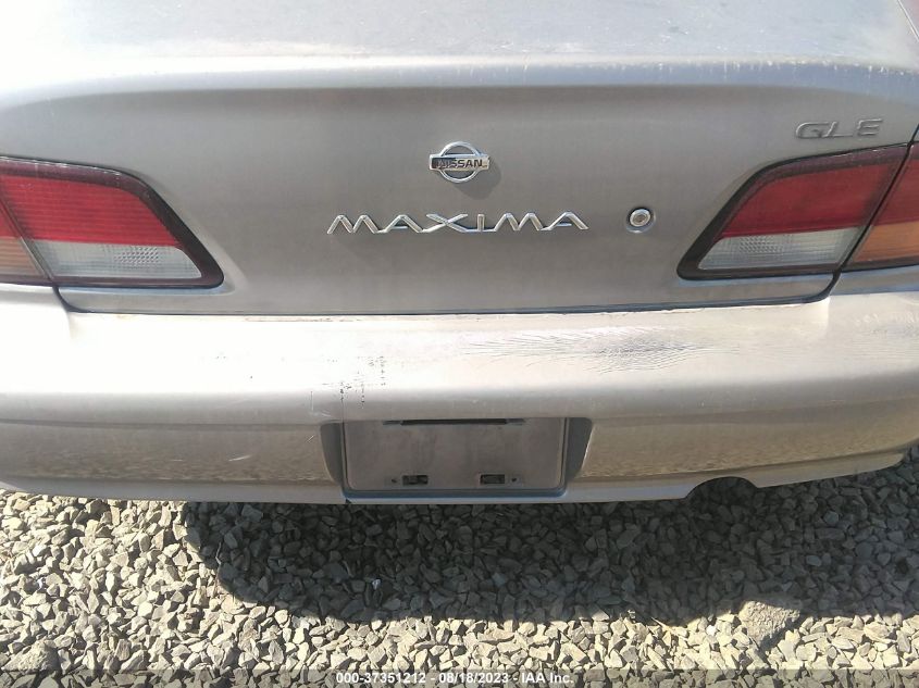 Photo 11 VIN: JN1CA21AXWT304573 - NISSAN MAXIMA 