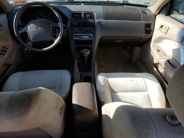 Photo 7 VIN: JN1CA21D0TT748518 - NISSAN MAXIMA GLE 