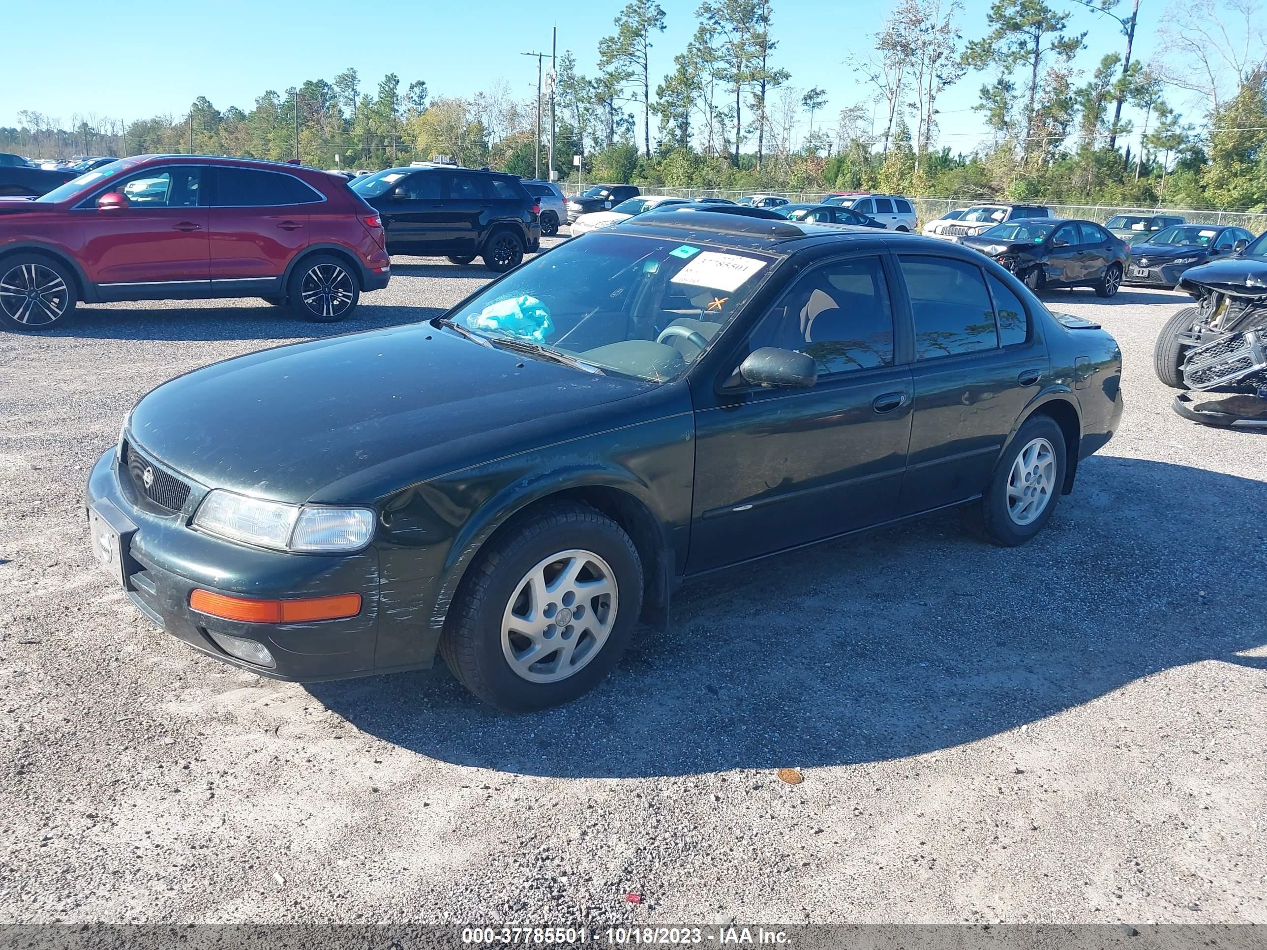 Photo 1 VIN: JN1CA21D1TT740606 - NISSAN MAXIMA 