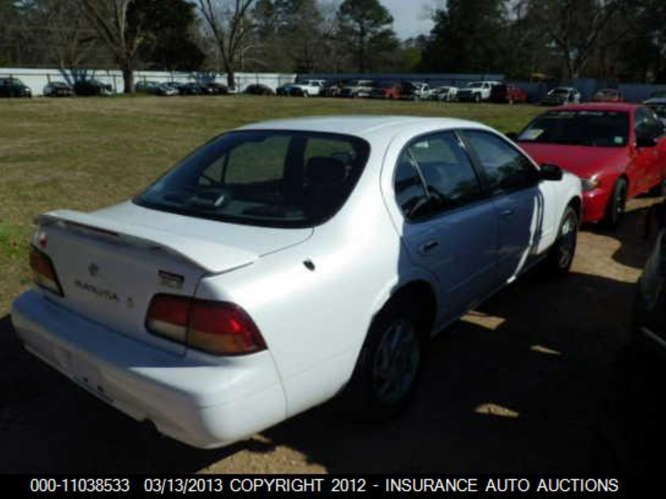 Photo 3 VIN: JN1CA21D1VT853801 - NISSAN MAXIMA 