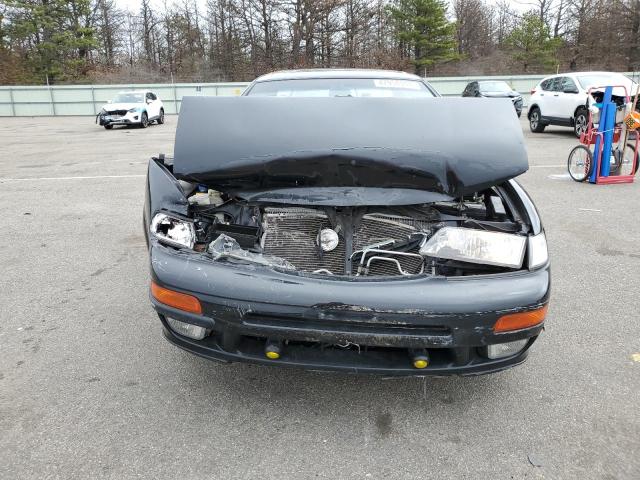 Photo 4 VIN: JN1CA21D3VM515701 - NISSAN MAXIMA 