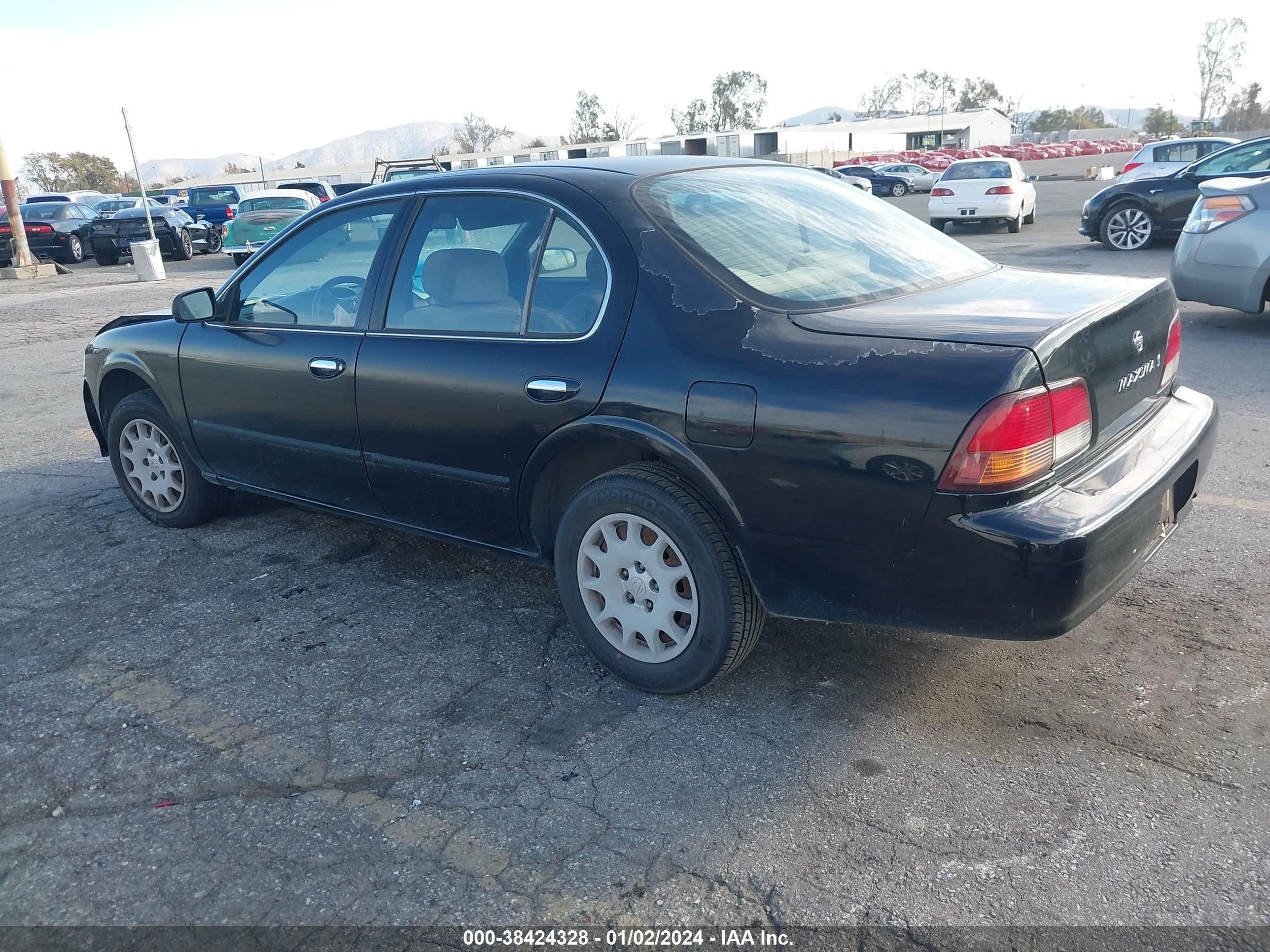 Photo 2 VIN: JN1CA21D4VM509311 - NISSAN MAXIMA 