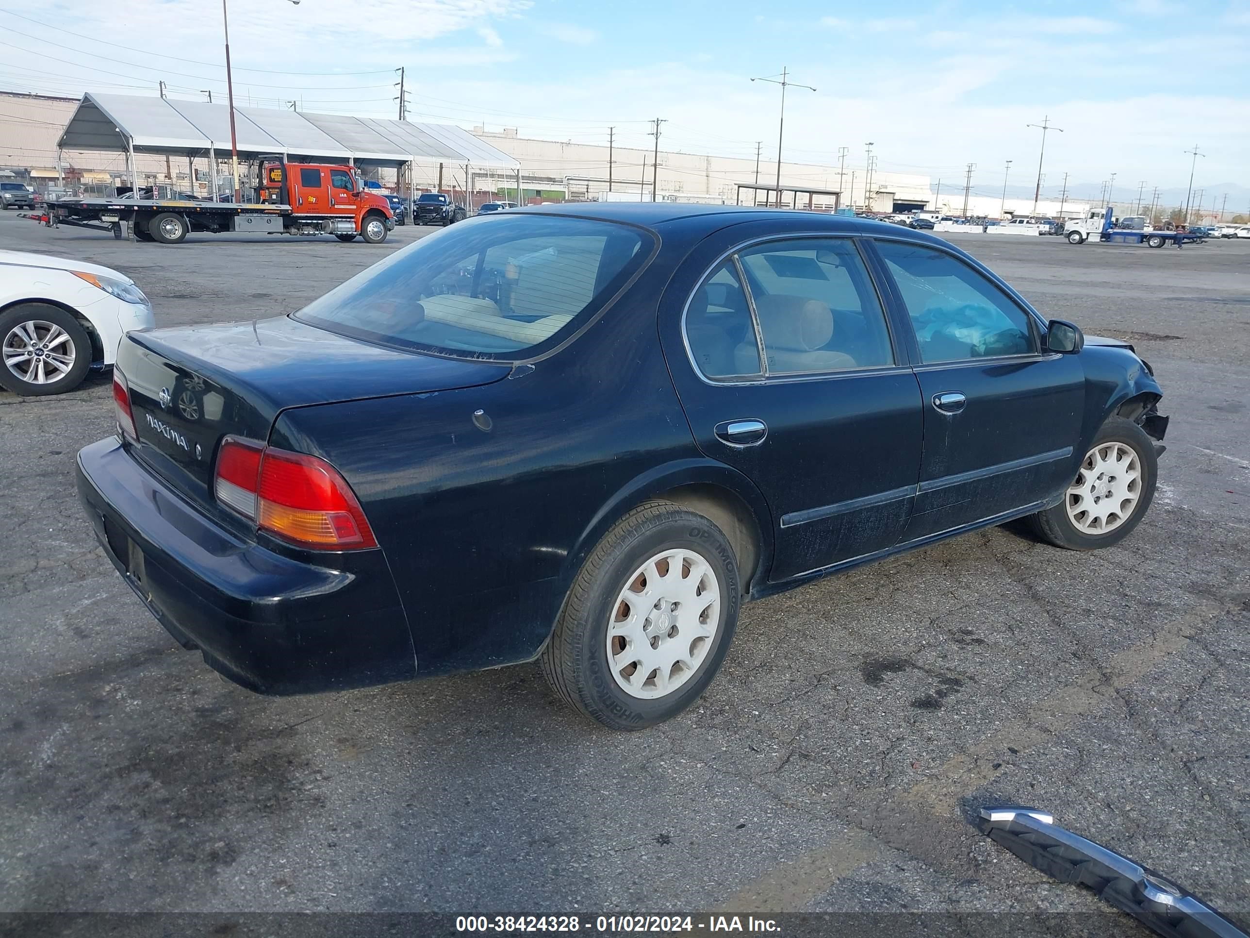 Photo 3 VIN: JN1CA21D4VM509311 - NISSAN MAXIMA 