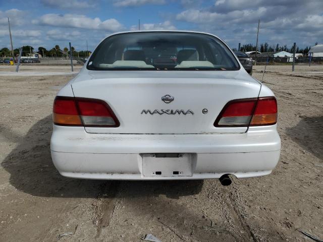 Photo 5 VIN: JN1CA21D4WM932598 - NISSAN MAXIMA 