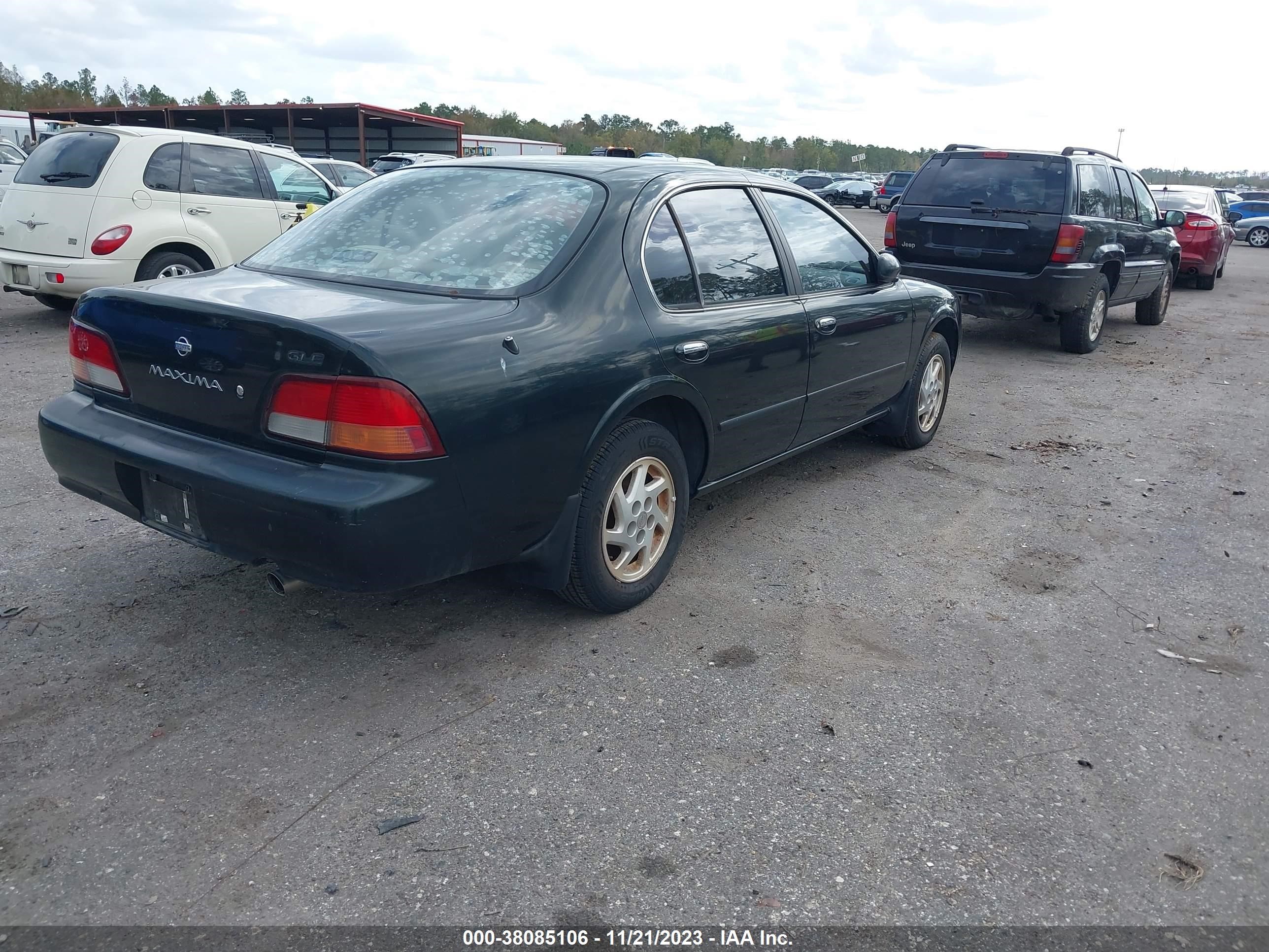 Photo 3 VIN: JN1CA21D7VM539497 - NISSAN MAXIMA 