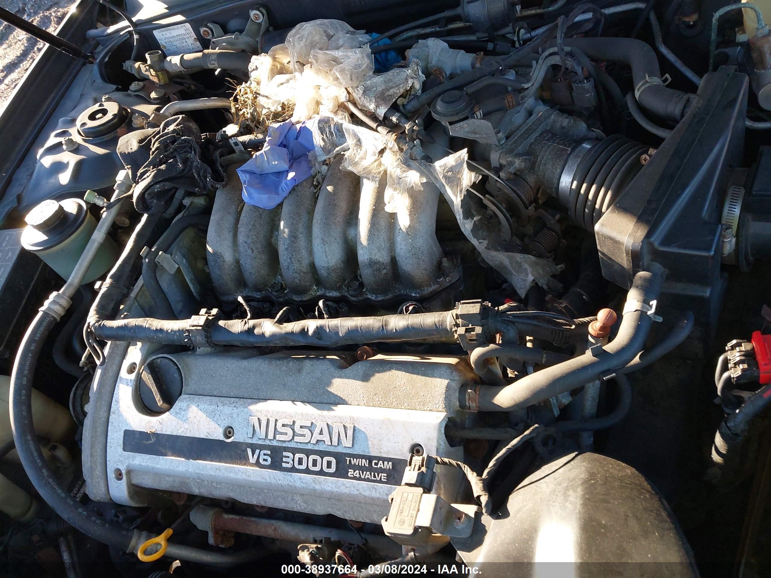 Photo 9 VIN: JN1CA21D8VM518707 - NISSAN MAXIMA 