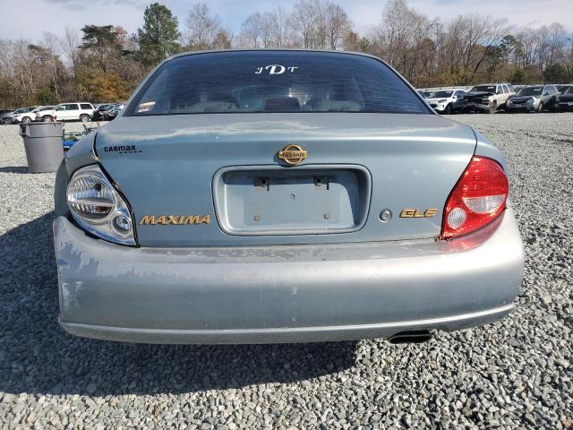 Photo 5 VIN: JN1CA31A4YT004827 - NISSAN MAXIMA GLE 