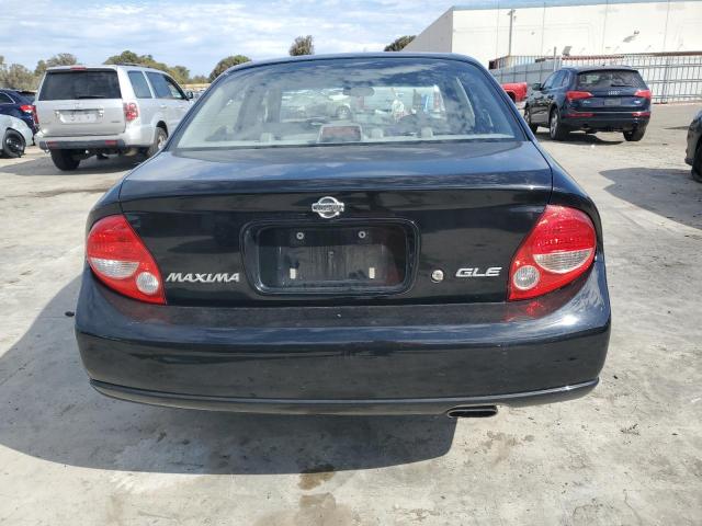 Photo 5 VIN: JN1CA31D1YT707098 - NISSAN MAXIMA GLE 